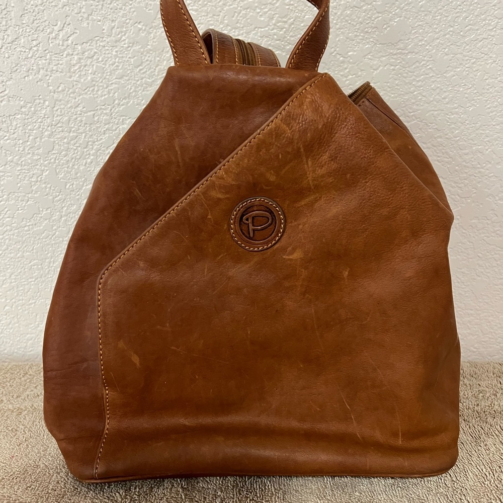 Brown Leather Backpack with Slouchy Design and Drawstring Closure